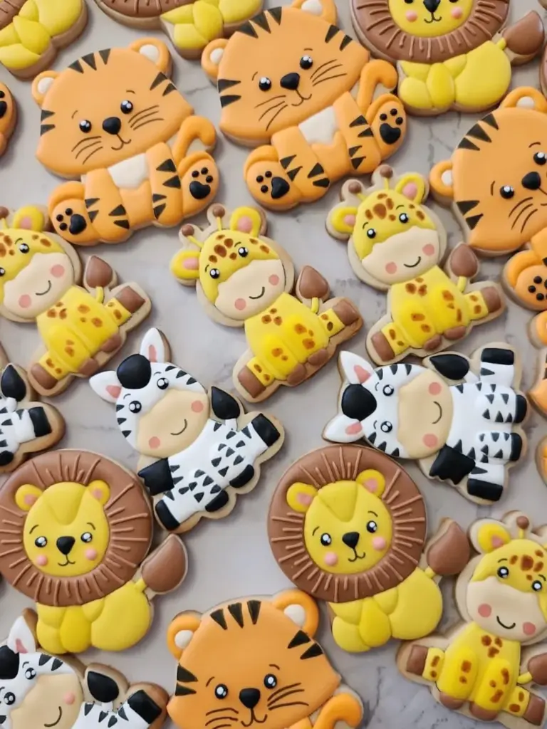 Galletas decoradas de animalitos de la selva: tigres, leones, jirafas y cebras